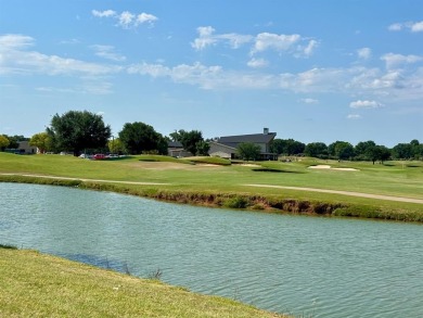 This exquisite four bedroom three bath Al Couto home boasts on Harbor Lakes Golf Club in Texas - for sale on GolfHomes.com, golf home, golf lot