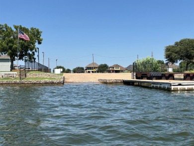 This exquisite four bedroom three bath Al Couto home boasts on Harbor Lakes Golf Club in Texas - for sale on GolfHomes.com, golf home, golf lot