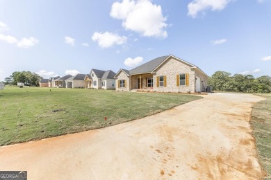 Open plan with beautiful golf course views. 4 bedrooms split on Southern Hills Golf Club in Georgia - for sale on GolfHomes.com, golf home, golf lot