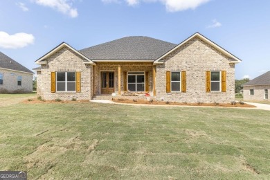 Open plan with beautiful golf course views. 4 bedrooms split on Southern Hills Golf Club in Georgia - for sale on GolfHomes.com, golf home, golf lot