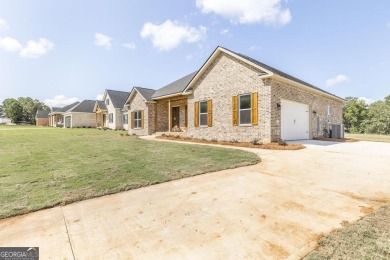 Open plan with beautiful golf course views. 4 bedrooms split on Southern Hills Golf Club in Georgia - for sale on GolfHomes.com, golf home, golf lot