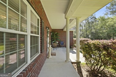 Live on vacation when you make 1653 Hawthorne Rd in the Shellman on Sapelo Hammock Golf Club in Georgia - for sale on GolfHomes.com, golf home, golf lot