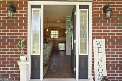Live on vacation when you make 1653 Hawthorne Rd in the Shellman on Sapelo Hammock Golf Club in Georgia - for sale on GolfHomes.com, golf home, golf lot