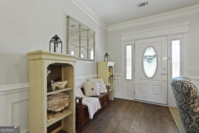 Live on vacation when you make 1653 Hawthorne Rd in the Shellman on Sapelo Hammock Golf Club in Georgia - for sale on GolfHomes.com, golf home, golf lot