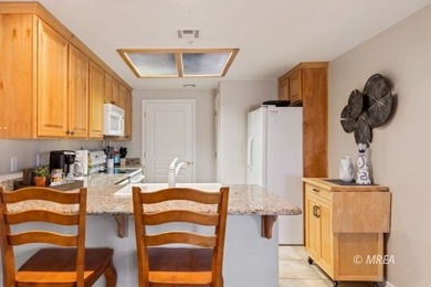 This FULLY FURNISHED AND ACCESSORIZED main level condo is on Wolf Creek At Paradise Canyon in Nevada - for sale on GolfHomes.com, golf home, golf lot