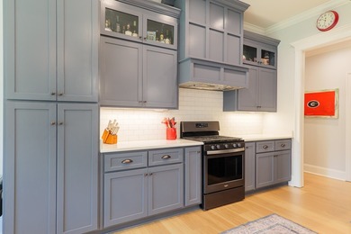 Welcome home to 4116 Eileen Court, where timeless design meets on Kinderlou Forest Golf Club in Georgia - for sale on GolfHomes.com, golf home, golf lot