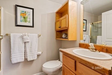 This FULLY FURNISHED AND ACCESSORIZED main level condo is on Wolf Creek At Paradise Canyon in Nevada - for sale on GolfHomes.com, golf home, golf lot