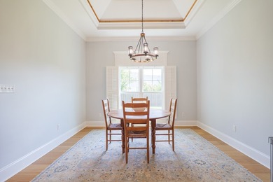 Welcome home to 4116 Eileen Court, where timeless design meets on Kinderlou Forest Golf Club in Georgia - for sale on GolfHomes.com, golf home, golf lot