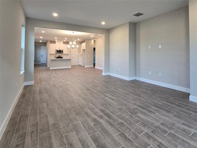 MOTIVATED Seller! Like New MAGARI MODEL HOME on a Beautiful on Stonegate Golf Club in Florida - for sale on GolfHomes.com, golf home, golf lot