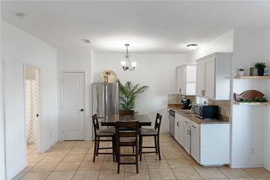 Dreamy Waterfront Townhome - Fully Furnished & Move in Ready on Padre Isles Golf Course in Texas - for sale on GolfHomes.com, golf home, golf lot