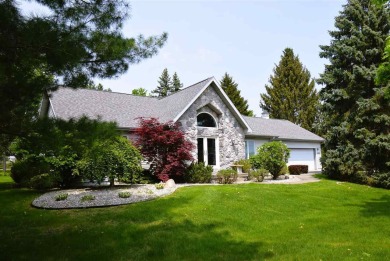 This Attractive and well-maintained contemporary home features on Grand Traverse Resort and Spa in Michigan - for sale on GolfHomes.com, golf home, golf lot
