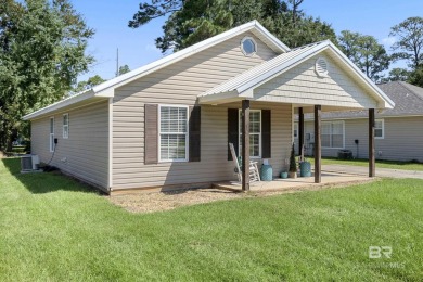 Discover this beautifully maintained 3-bedroom, 2-bath home on Gulf State Park Golf Course in Alabama - for sale on GolfHomes.com, golf home, golf lot