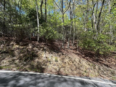 Excellent lot for your next build project. This lot is ideal for on Connestee Falls Golf Club in North Carolina - for sale on GolfHomes.com, golf home, golf lot