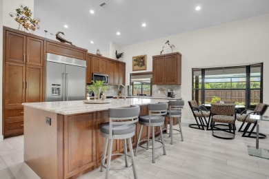 Welcome to 4256 Gleneagles Drive, a stunning, one-story on Pine Tree Golf Club in Florida - for sale on GolfHomes.com, golf home, golf lot