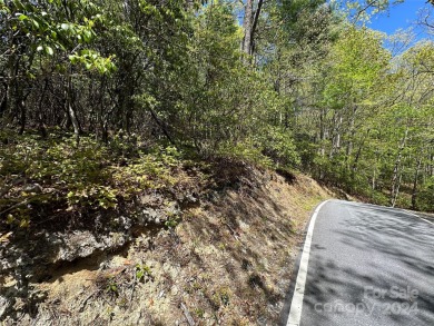 Excellent lot for your next build project. This lot is ideal for on Connestee Falls Golf Club in North Carolina - for sale on GolfHomes.com, golf home, golf lot