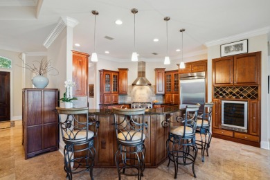This exquisite lakefront home is a true standout, offering on Kelly Plantation Golf Club in Florida - for sale on GolfHomes.com, golf home, golf lot