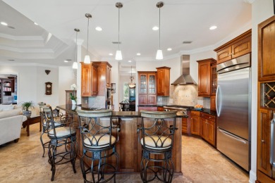 This exquisite lakefront home is a true standout, offering on Kelly Plantation Golf Club in Florida - for sale on GolfHomes.com, golf home, golf lot