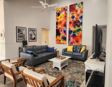 This stunning Mediterranean/Spanish-style home embodies elegance on Bear Lakes Country Club in Florida - for sale on GolfHomes.com, golf home, golf lot