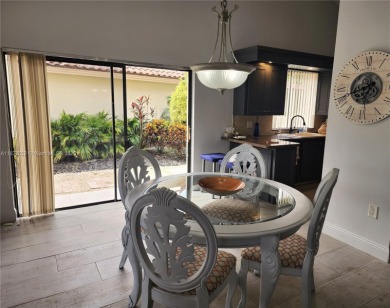 This stunning Mediterranean/Spanish-style home embodies elegance on Bear Lakes Country Club in Florida - for sale on GolfHomes.com, golf home, golf lot