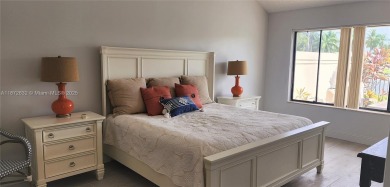 This stunning Mediterranean/Spanish-style home embodies elegance on Bear Lakes Country Club in Florida - for sale on GolfHomes.com, golf home, golf lot