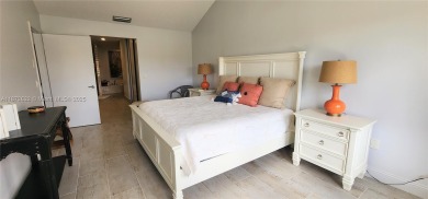 This stunning Mediterranean/Spanish-style home embodies elegance on Bear Lakes Country Club in Florida - for sale on GolfHomes.com, golf home, golf lot