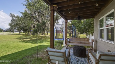 MOTIVATED SELLERWelcome to this charming 4-bedroom, 2.5-bathroom on Panama Country Club in Florida - for sale on GolfHomes.com, golf home, golf lot