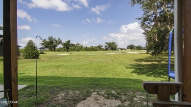 MOTIVATED SELLERWelcome to this charming 4-bedroom, 2.5-bathroom on Panama Country Club in Florida - for sale on GolfHomes.com, golf home, golf lot