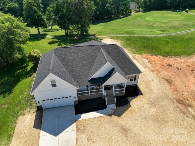 Fabulous golf course home featuring impressive vaulted ceiling on Woodbridge Golf Links in North Carolina - for sale on GolfHomes.com, golf home, golf lot