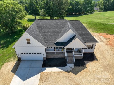 Fabulous golf course home featuring impressive vaulted ceiling on Woodbridge Golf Links in North Carolina - for sale on GolfHomes.com, golf home, golf lot