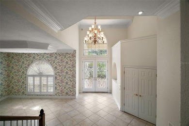 Lakefront home in the desirable Country Club of Mount Dora! on Country Club of Mount Dora in Florida - for sale on GolfHomes.com, golf home, golf lot