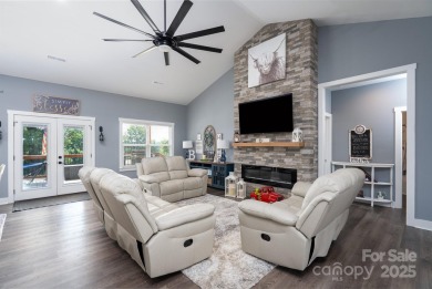 Fabulous golf course home featuring impressive vaulted ceiling on Woodbridge Golf Links in North Carolina - for sale on GolfHomes.com, golf home, golf lot