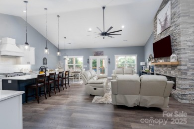 Fabulous golf course home featuring impressive vaulted ceiling on Woodbridge Golf Links in North Carolina - for sale on GolfHomes.com, golf home, golf lot