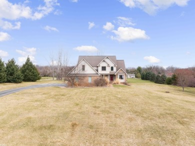 This 5 bedroom home located in a tranquil setting on over 1.5 on Springfield Oaks Golf Course in Michigan - for sale on GolfHomes.com, golf home, golf lot