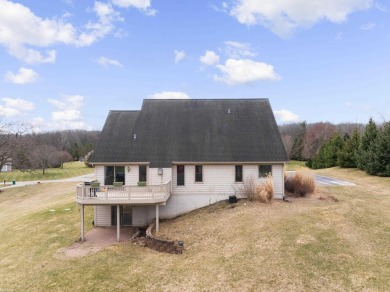 This 5 bedroom home located in a tranquil setting on over 1.5 on Springfield Oaks Golf Course in Michigan - for sale on GolfHomes.com, golf home, golf lot