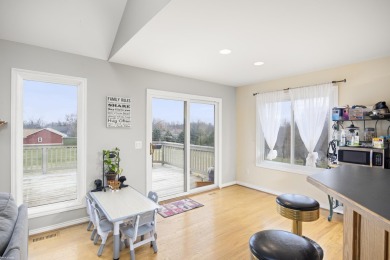 This 5 bedroom home located in a tranquil setting on over 1.5 on Springfield Oaks Golf Course in Michigan - for sale on GolfHomes.com, golf home, golf lot