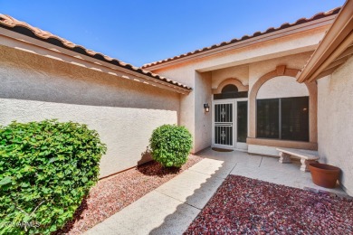 This Camelback model with vaulted ceilings and enclosed patio on Westbrook Village Golf Club in Arizona - for sale on GolfHomes.com, golf home, golf lot