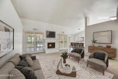 This Camelback model with vaulted ceilings and enclosed patio on Westbrook Village Golf Club in Arizona - for sale on GolfHomes.com, golf home, golf lot