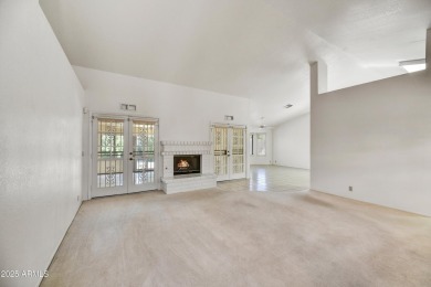 This Camelback model with vaulted ceilings and enclosed patio on Westbrook Village Golf Club in Arizona - for sale on GolfHomes.com, golf home, golf lot