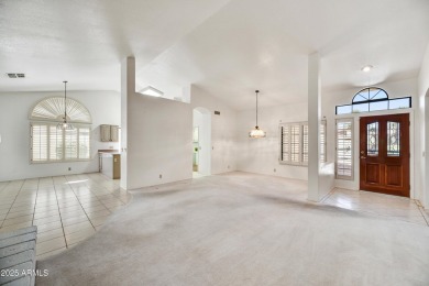 This Camelback model with vaulted ceilings and enclosed patio on Westbrook Village Golf Club in Arizona - for sale on GolfHomes.com, golf home, golf lot