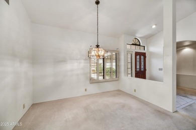 This Camelback model with vaulted ceilings and enclosed patio on Westbrook Village Golf Club in Arizona - for sale on GolfHomes.com, golf home, golf lot