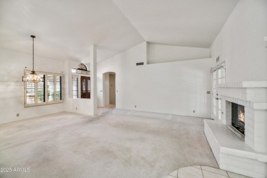 This Camelback model with vaulted ceilings and enclosed patio on Westbrook Village Golf Club in Arizona - for sale on GolfHomes.com, golf home, golf lot