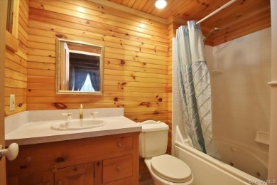 This unique Cape Cod is located in the Gottscheer Country Club on Osiris Country Club in New York - for sale on GolfHomes.com, golf home, golf lot