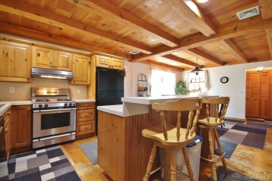This unique Cape Cod is located in the Gottscheer Country Club on Osiris Country Club in New York - for sale on GolfHomes.com, golf home, golf lot