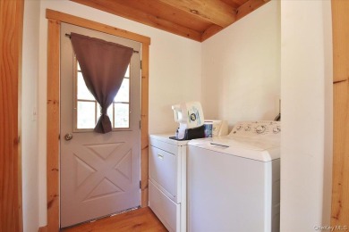This unique Cape Cod is located in the Gottscheer Country Club on Osiris Country Club in New York - for sale on GolfHomes.com, golf home, golf lot