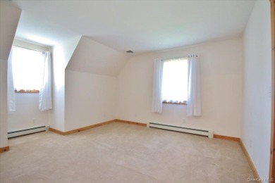 This unique Cape Cod is located in the Gottscheer Country Club on Osiris Country Club in New York - for sale on GolfHomes.com, golf home, golf lot