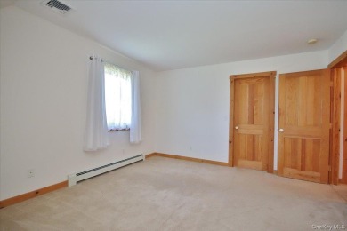 This unique Cape Cod is located in the Gottscheer Country Club on Osiris Country Club in New York - for sale on GolfHomes.com, golf home, golf lot