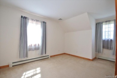 This unique Cape Cod is located in the Gottscheer Country Club on Osiris Country Club in New York - for sale on GolfHomes.com, golf home, golf lot