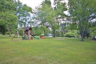 This unique Cape Cod is located in the Gottscheer Country Club on Osiris Country Club in New York - for sale on GolfHomes.com, golf home, golf lot