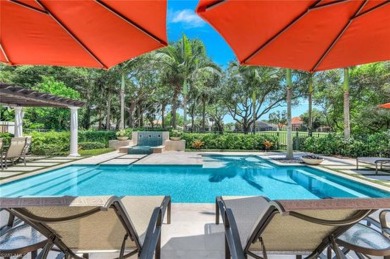 Step into the lap of luxury within the breathtaking and on Club at Pelican Bay Golf Course in Florida - for sale on GolfHomes.com, golf home, golf lot