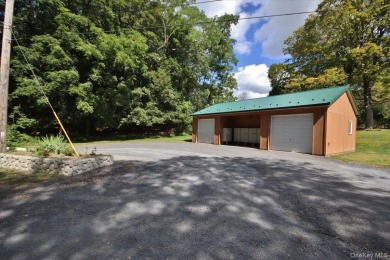 This unique Cape Cod is located in the Gottscheer Country Club on Osiris Country Club in New York - for sale on GolfHomes.com, golf home, golf lot